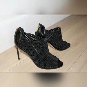 Marc Fisher black peddle peep toe heels